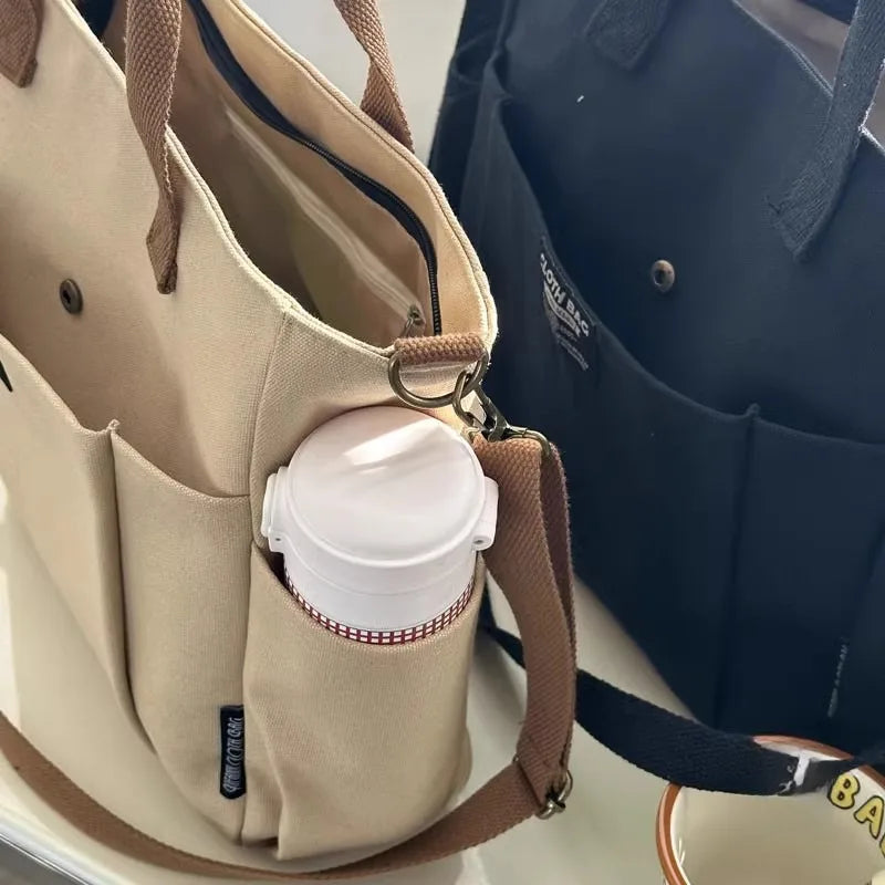 Urban Minimalist Female Student Large Capacity Commuting Horizontal Canvas Single Shoulder Diagonal Cross Portable Tote Bag Abysaz Kollectionz