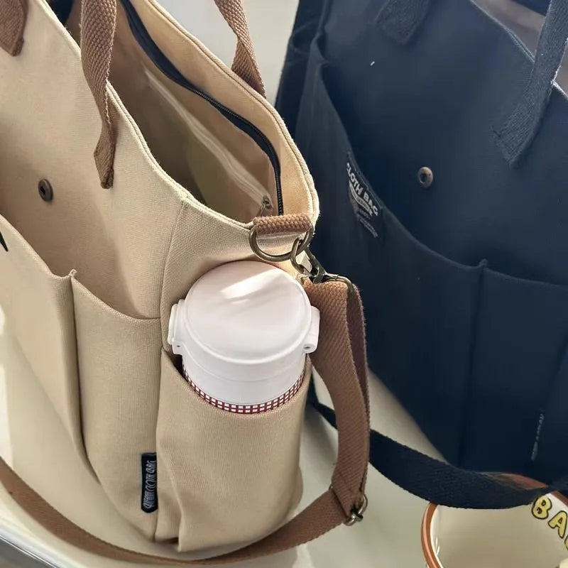 Urban Minimalist Female Student Large Capacity Commuting Horizontal Canvas Single Shoulder Diagonal Cross Portable Tote Bag Abysaz Kollectionz